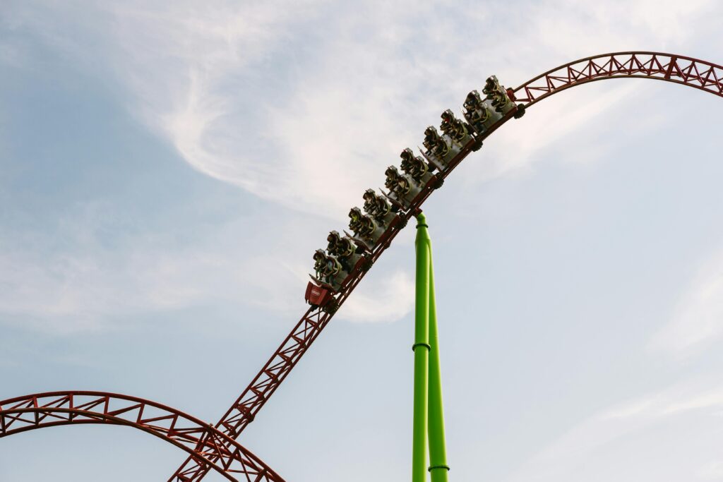 Experience the thrill of a high-speed roller coaster ride at an amusement park.